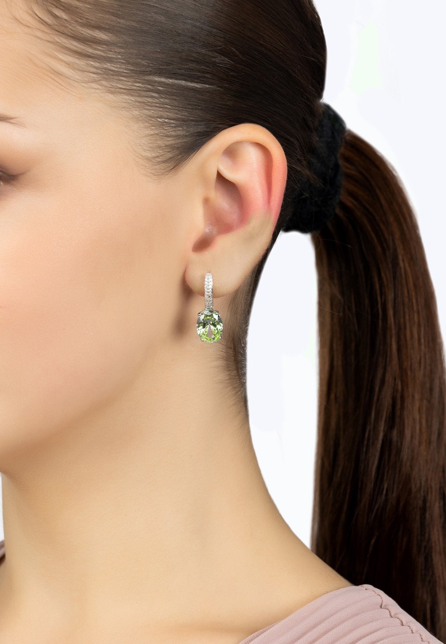 Alexandra Oval Drop Earrings in Silver featuring lab-created Peridot and simulated diamonds, showcasing elegant design and craftsmanship.