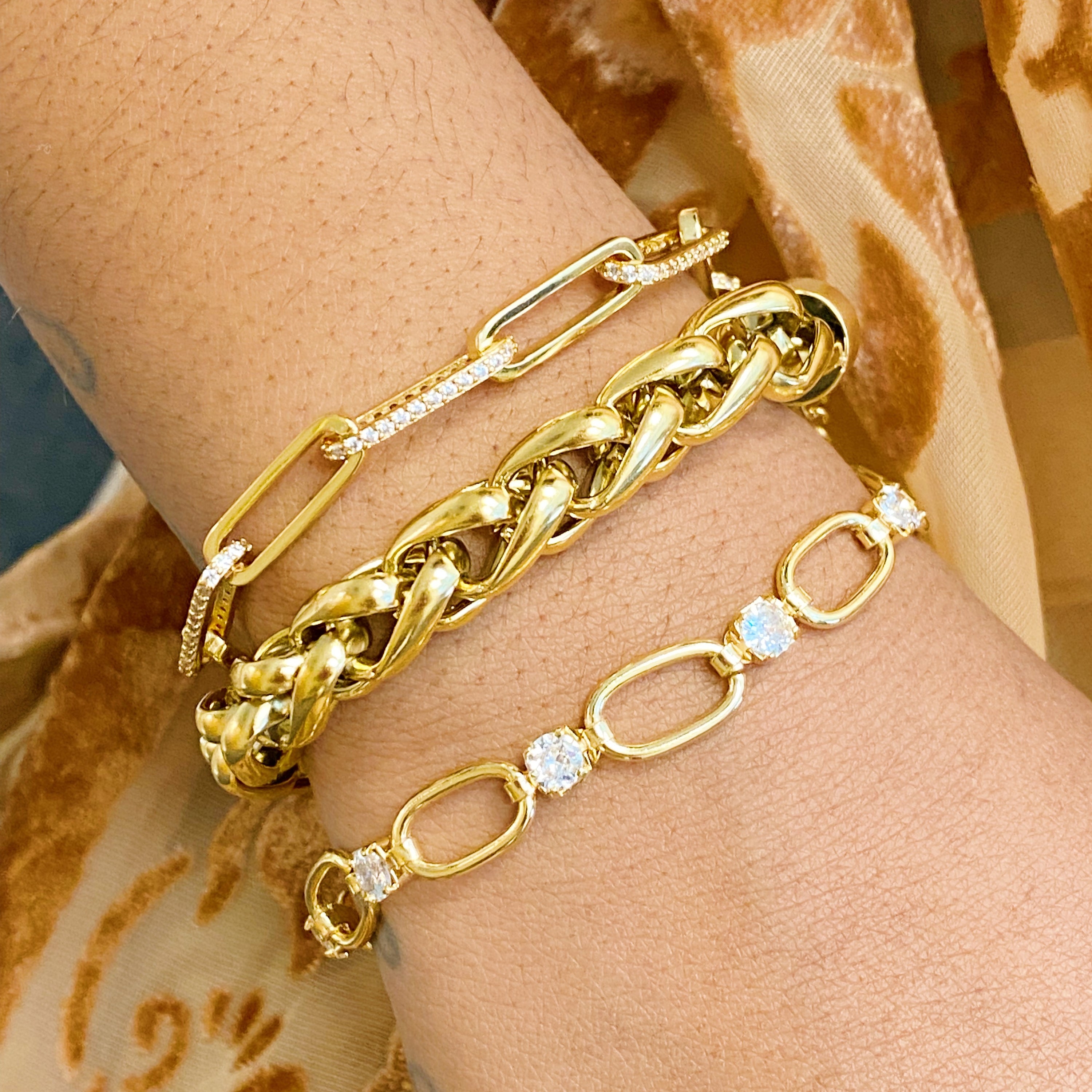 Alternative Shine Link Chain Bracelet featuring alternating sparkly and plain links, crafted from gold plated brass with cubic zirconia accents.