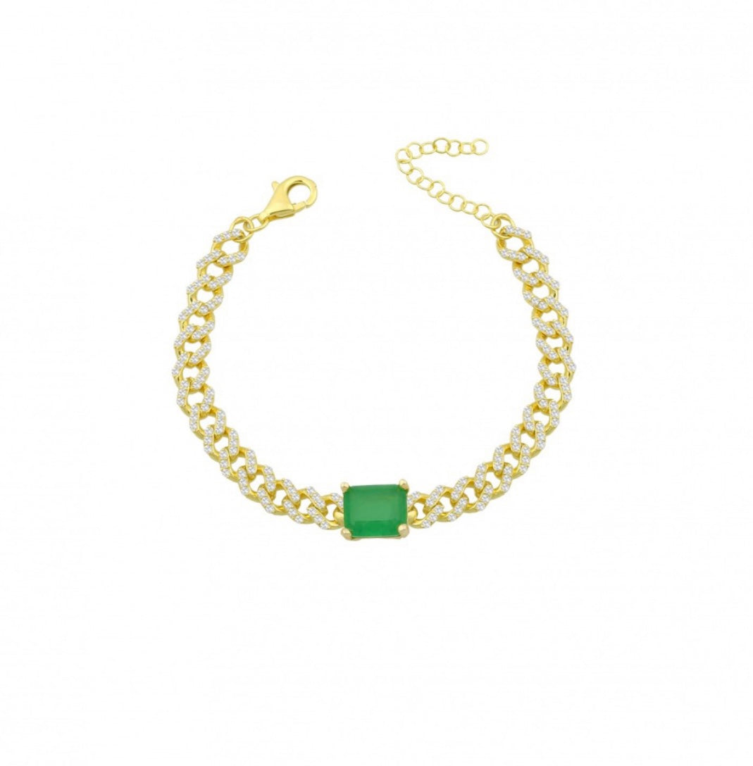 ALYA Bracelet featuring a chunky Miami curb chain with cubic zirconias and an emerald stone, elegantly designed in yellow gold plating.