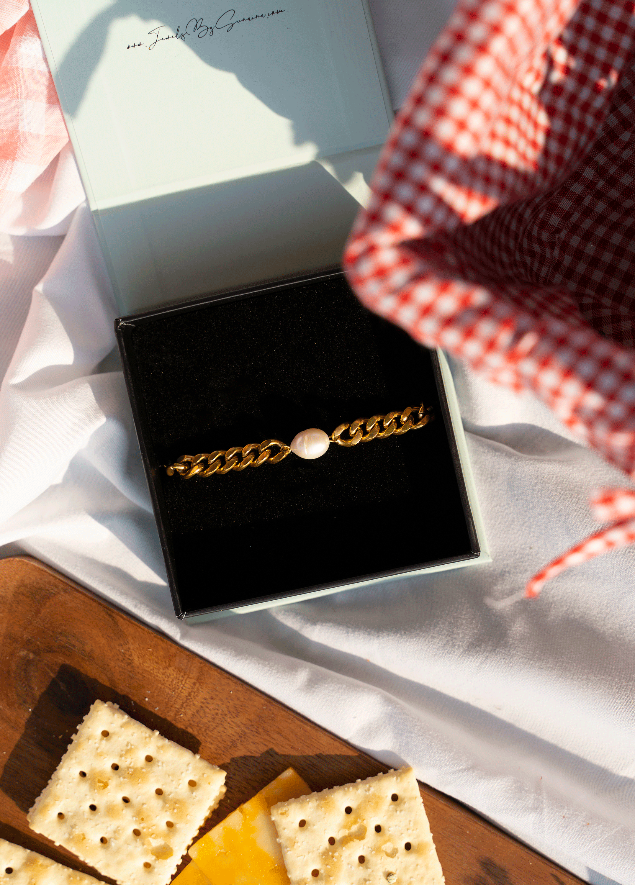 AMAYA Bracelet featuring bold Miami Cuban links and a freshwater pearl, elegantly designed in 18k yellow gold plating.