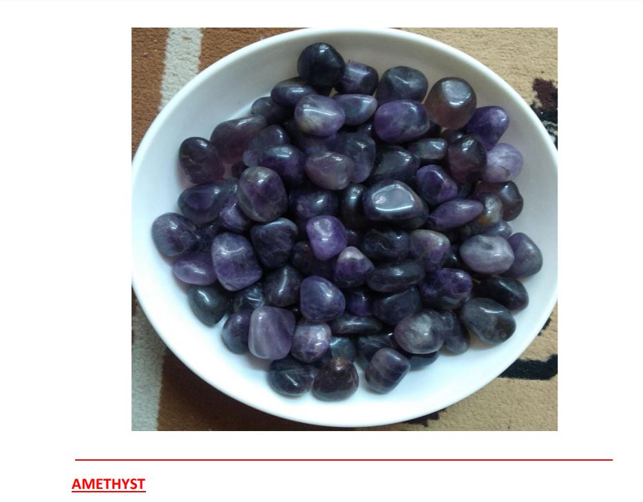 A collection of polished amethyst gemstone tumble stones showcasing their rich purple color and unique shapes.