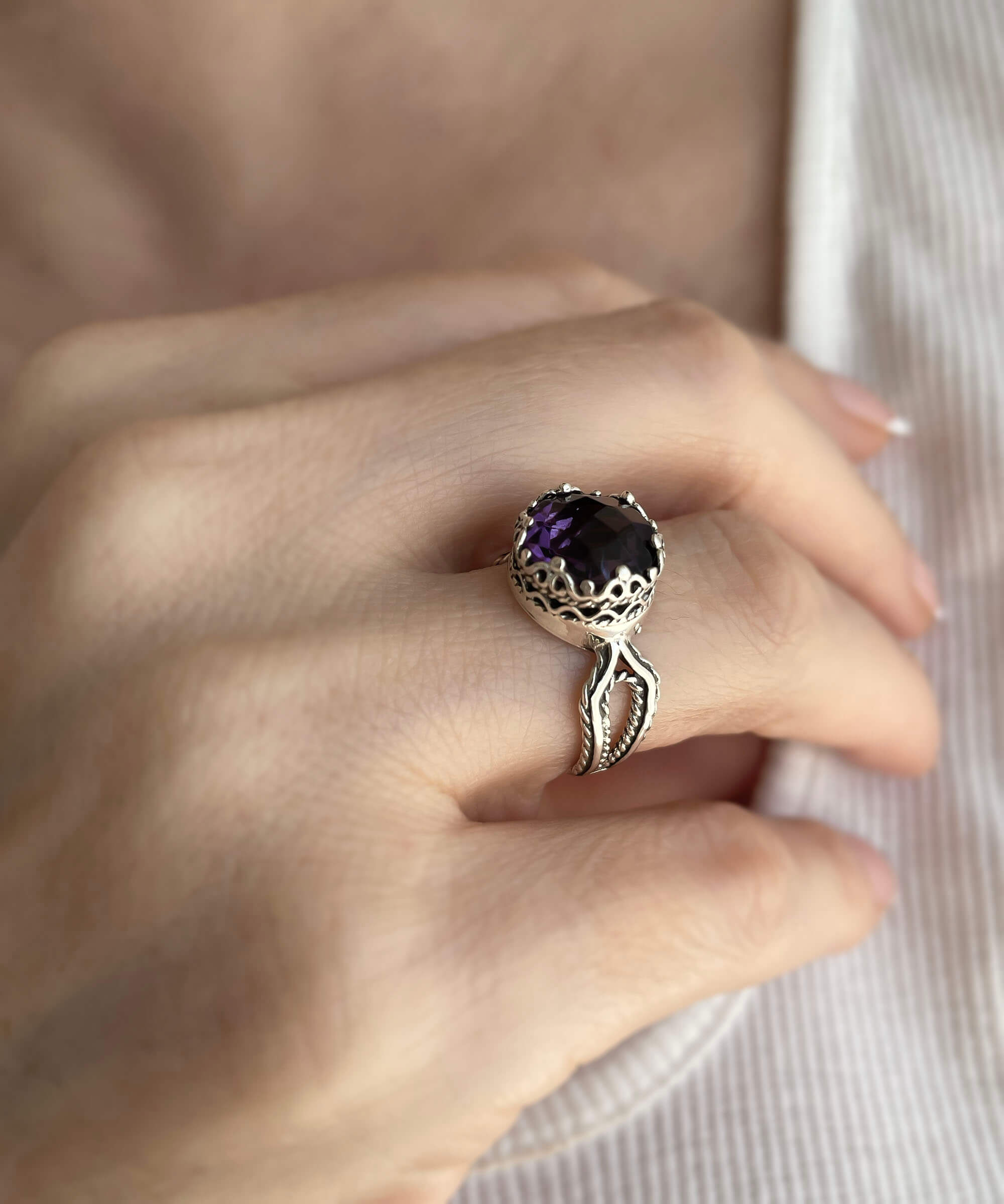 Amethyst gemstone women sterling silver cocktail ring featuring intricate filigree design and a round-cut 10mm amethyst stone.