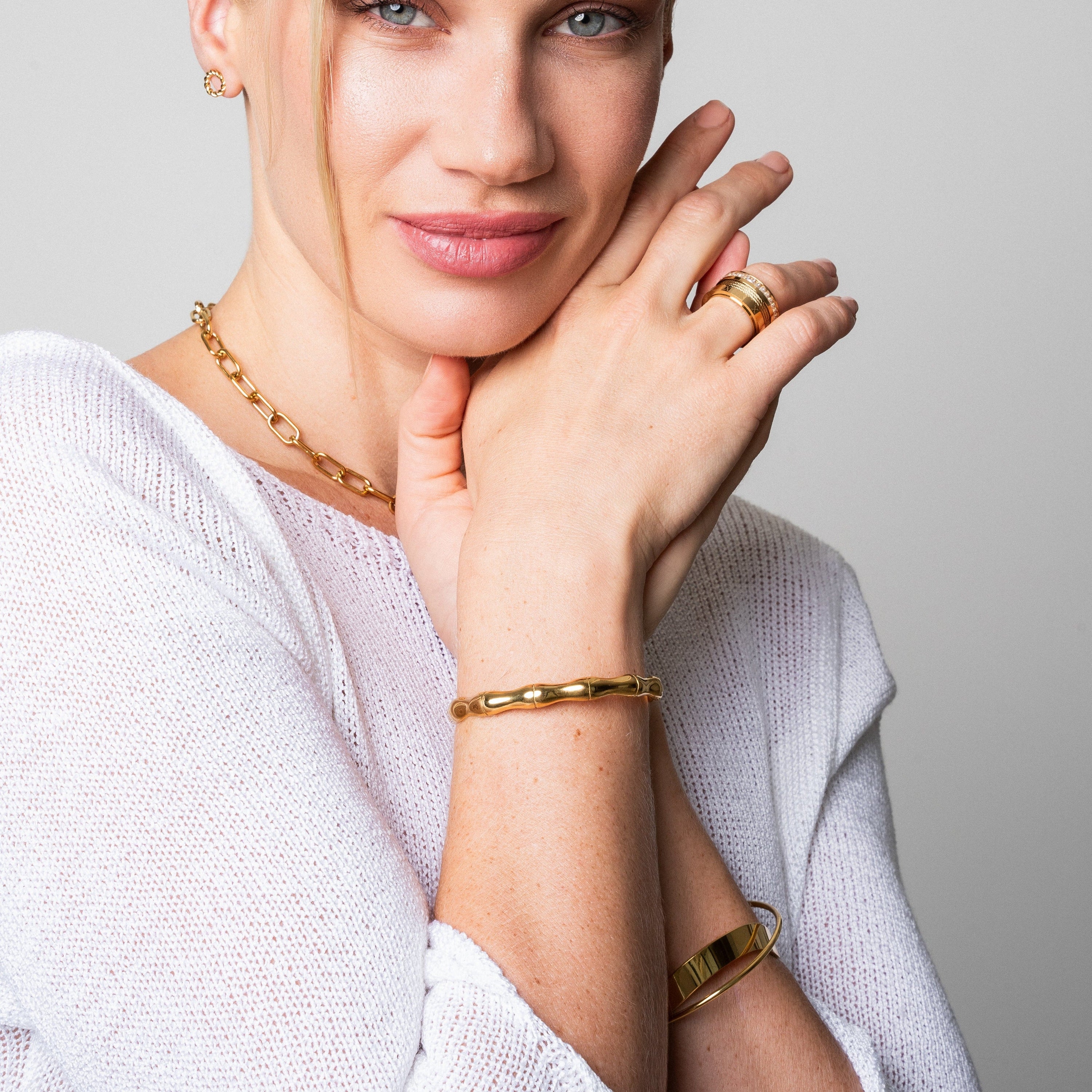 Amira Bamboo Bangle Bracelet in gold, made from premium stainless steel with a sleek design.