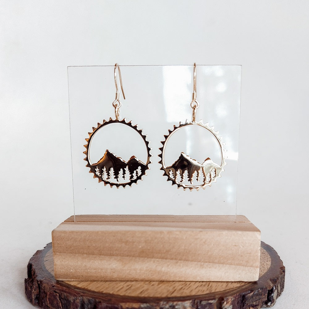 Sterling silver Amore Mountain Earrings featuring a mountainscape design on a chain, with shepherd hooks and silicone backings.