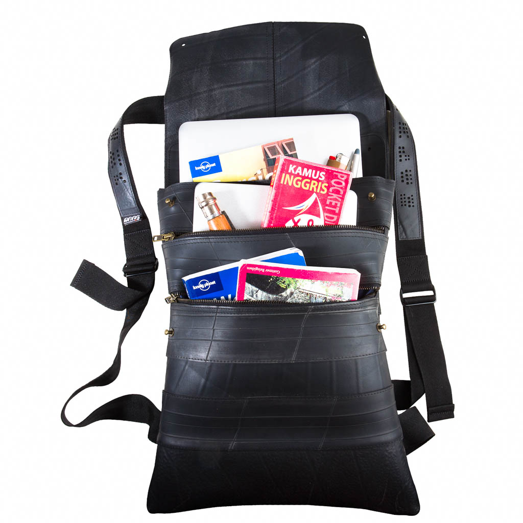 Ando Slimline Inner Tube Vegan Backpack made from recycled rubber, featuring adjustable straps and a button fastening flap.