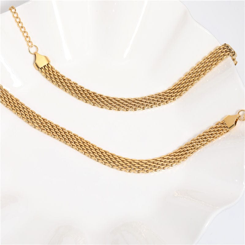 Andreas Mesh Chain Necklace in Gold, featuring a wide woven design made of stainless steel with 18K gold plating, showcasing elegance and durability.