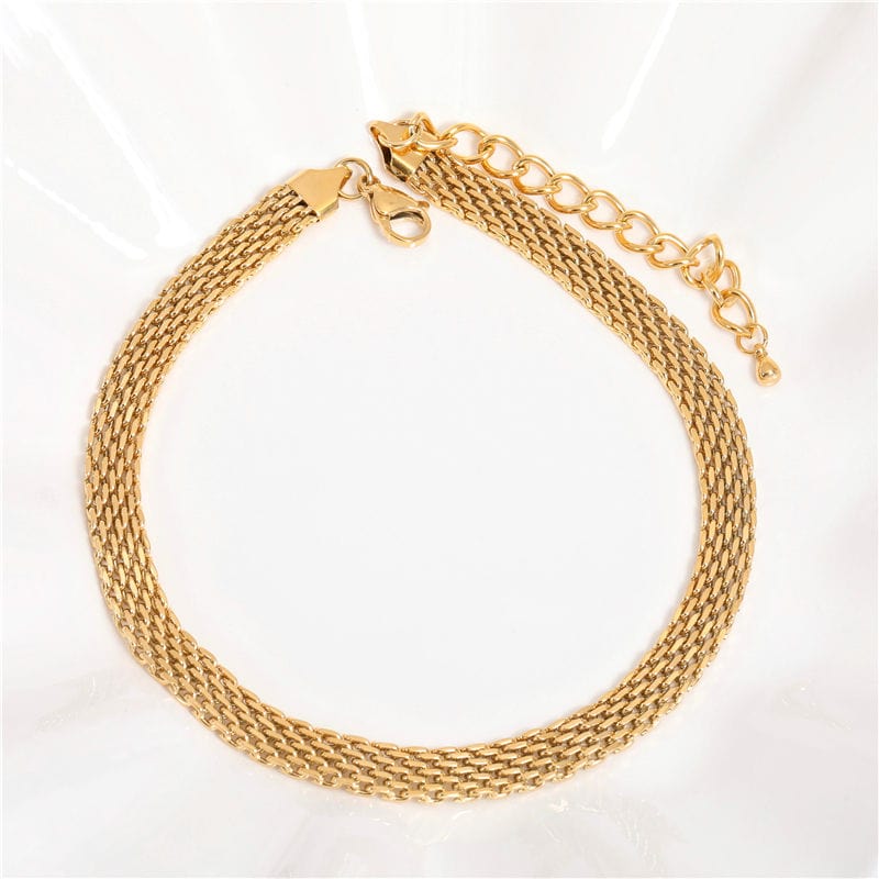 Andreas Mesh Chain Necklace in Gold, featuring a wide woven design made of stainless steel with 18K gold plating, showcasing elegance and durability.