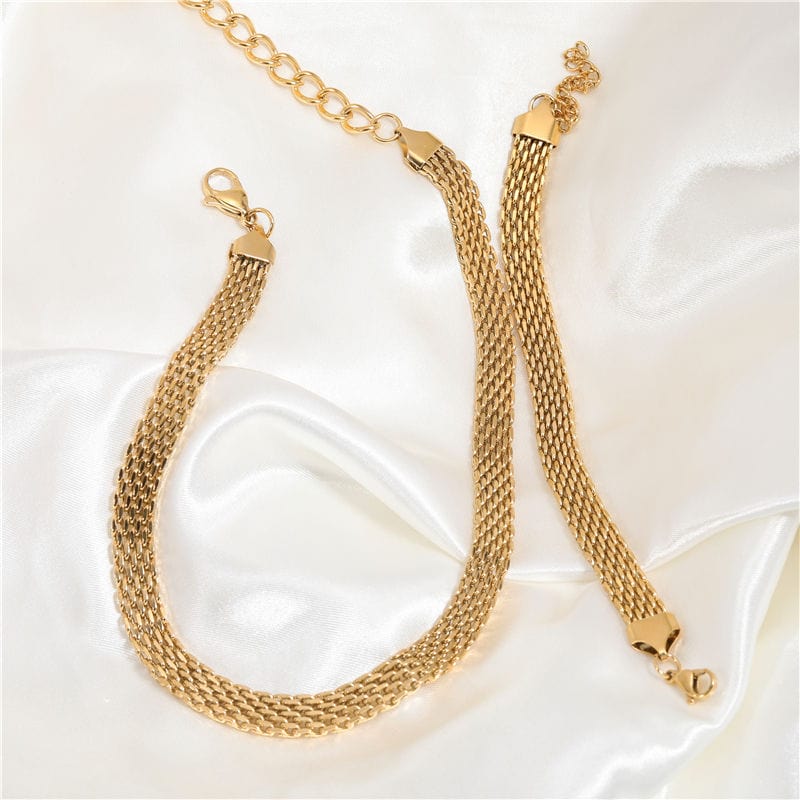 Andreas Mesh Chain Necklace in Gold, featuring a wide woven design made of stainless steel with 18K gold plating, showcasing elegance and durability.