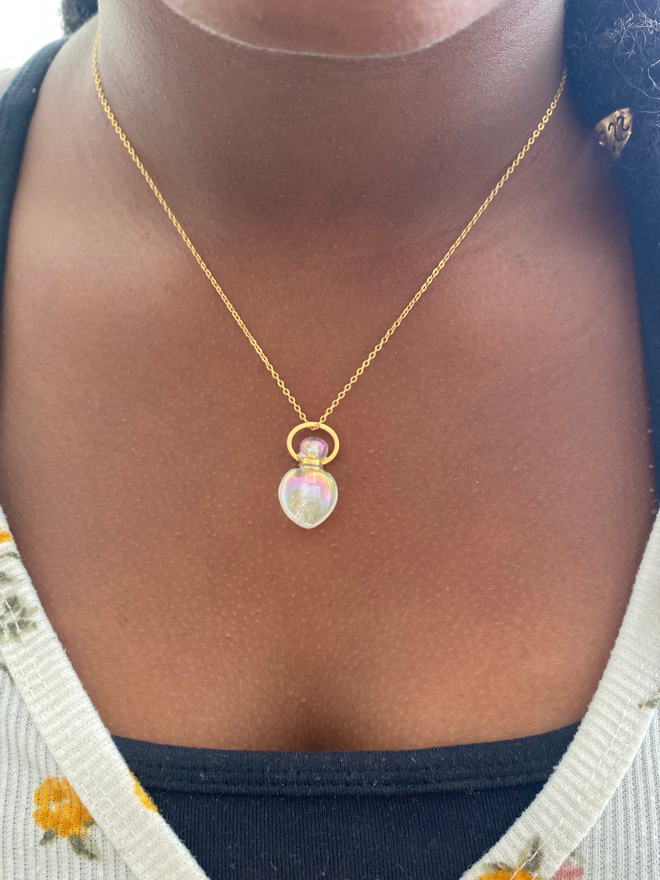 Angel Aura Aroma Gem Necklace featuring a teardrop pendant made of angel aura quartz, designed to hold essential oils.