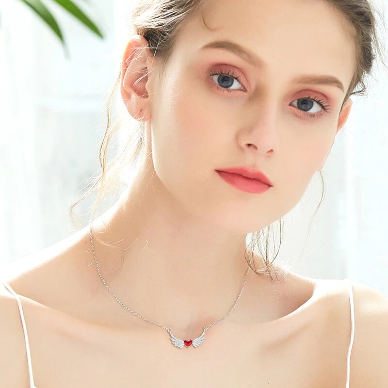 Angel in My Heart Forever Necklace featuring a heart-shaped cubic zirconia on a rhodium-plated link chain.