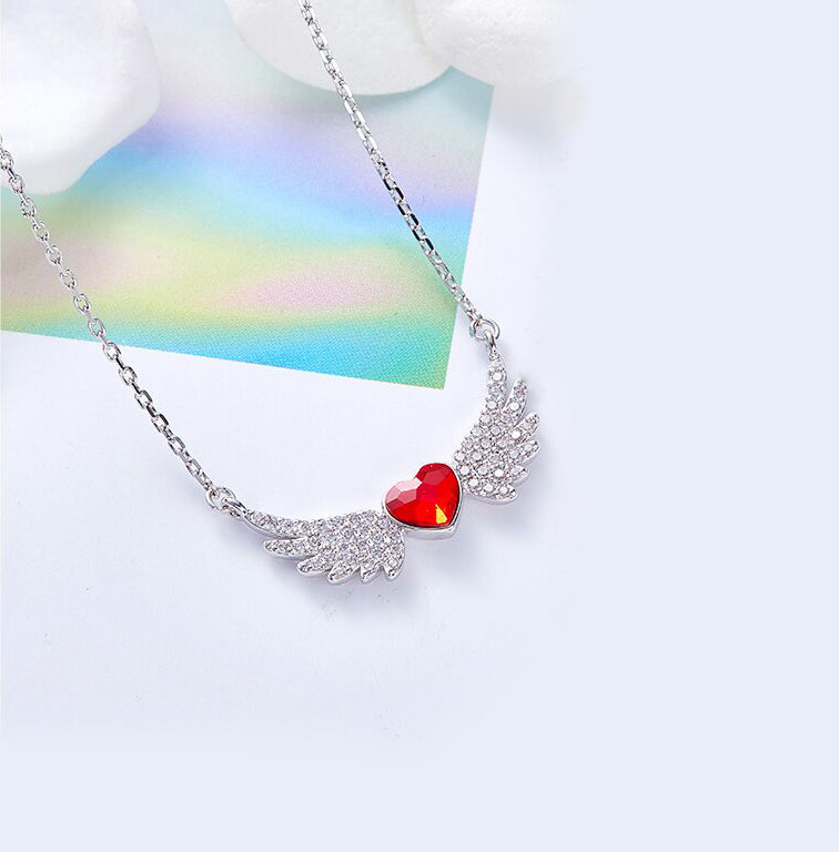 Angel in My Heart Forever Necklace featuring a heart-shaped cubic zirconia on a rhodium-plated link chain.