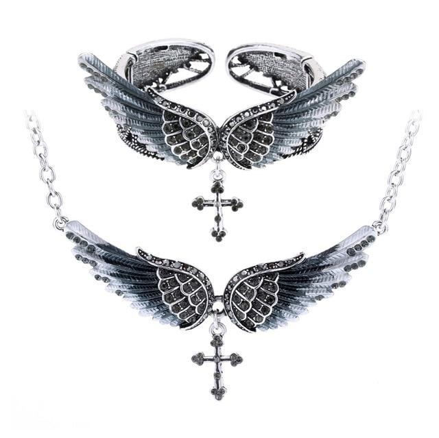 Angel wing cross necklace and bracelet set for women, featuring intricate designs in zinc alloy and crystal accents, perfect for biker jewelry lovers.