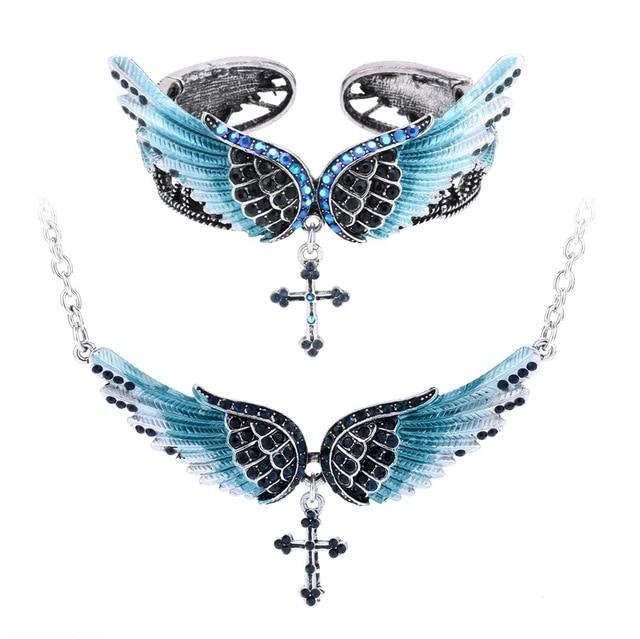 Angel wing cross necklace and bracelet set for women, featuring intricate designs in zinc alloy and crystal accents, perfect for biker jewelry lovers.