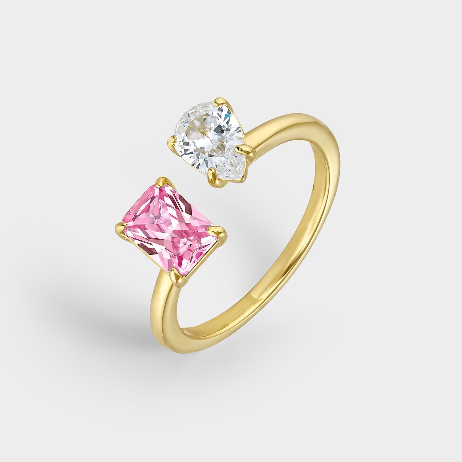 Anillo de plata bañada en oro amarillo con circonitas rosa y blanca, elegante y brillante, ideal para cualquier ocasión.