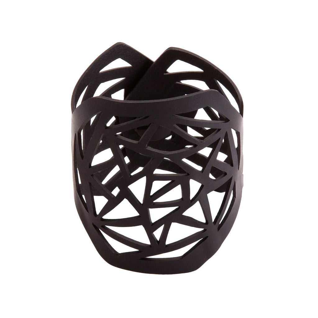 Anita Recycled Rubber Bracelet featuring a geometric design, handcrafted from reclaimed rubber, displayed elegantly in a luxury gift box.