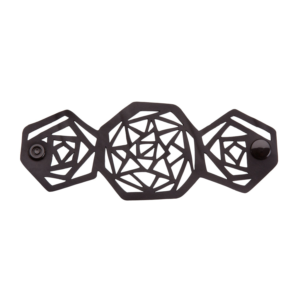 Anita Recycled Rubber Bracelet featuring a geometric design, handcrafted from reclaimed rubber, displayed elegantly in a luxury gift box.