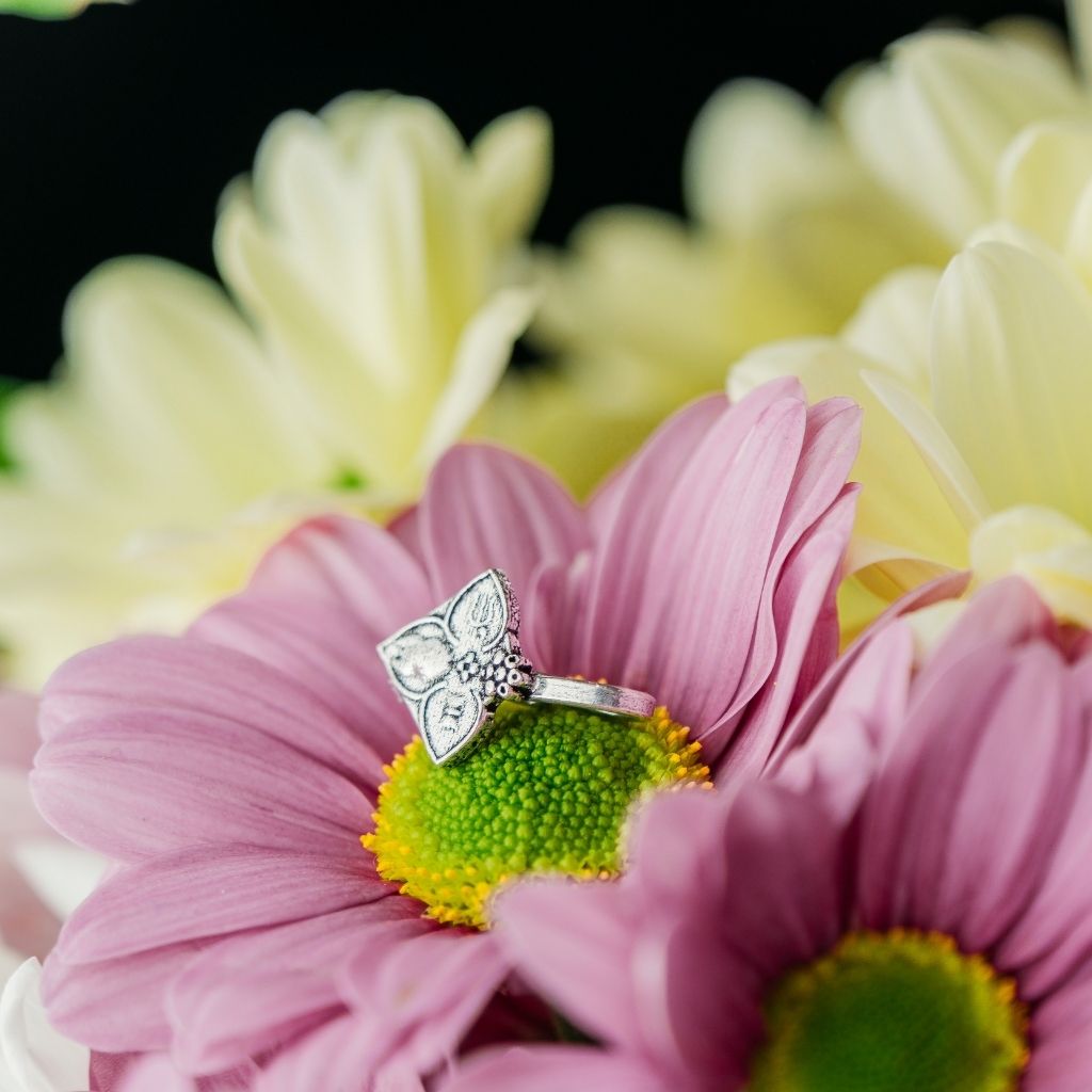 Antique Quality Oxidised German Silver Floral Non Pierced Nose Pin with intricate floral design, showcasing a beautiful silver hue.