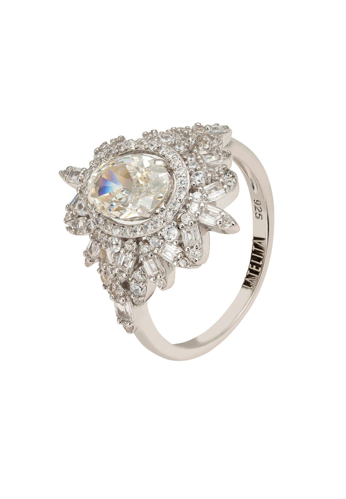 Arabesque Splendor Cocktail Ring featuring a central oval Moissanite stone surrounded by cubic zirconia in a floral silver design.