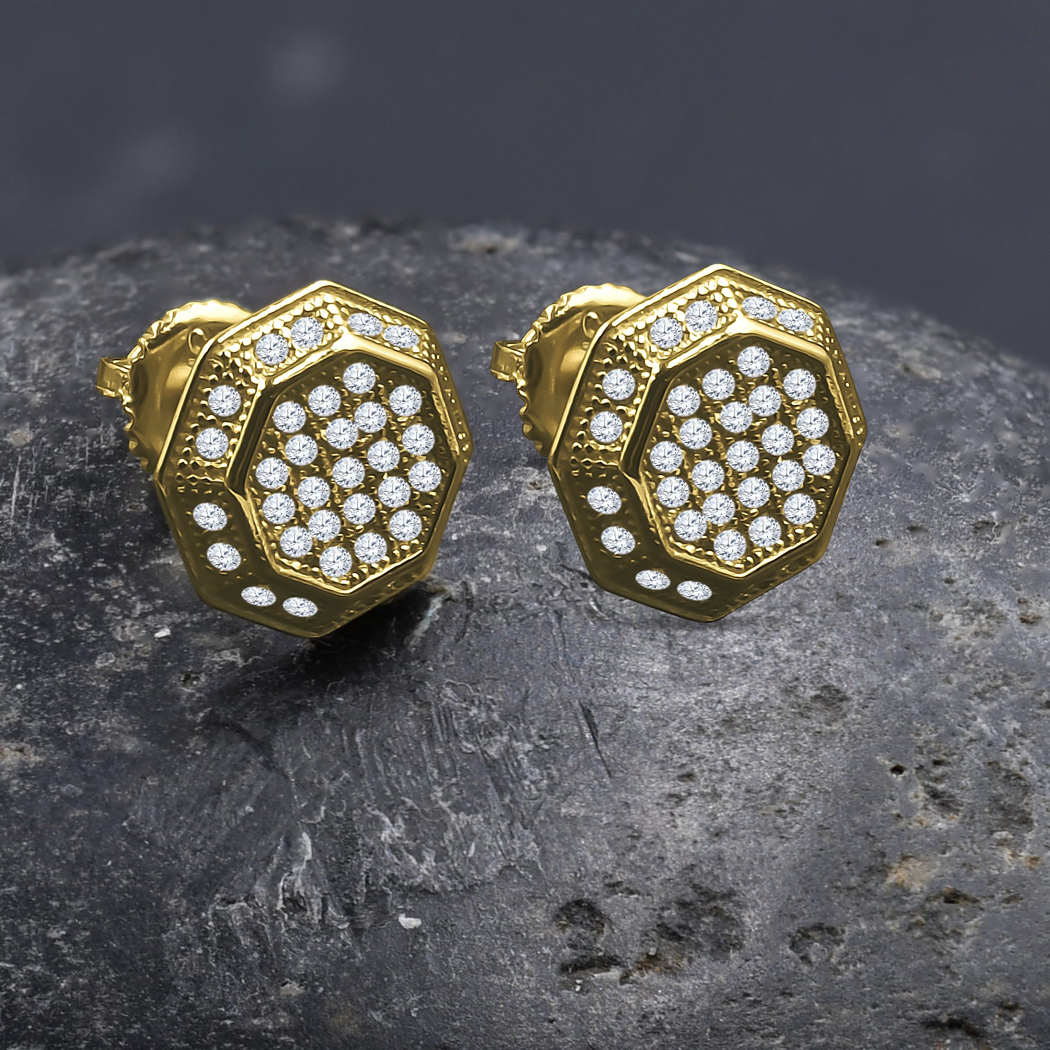 A pair of ARCHAIC Screw Back Earrings featuring brass copper metal and sparkling cubic zircon stones, showcasing a unique design.