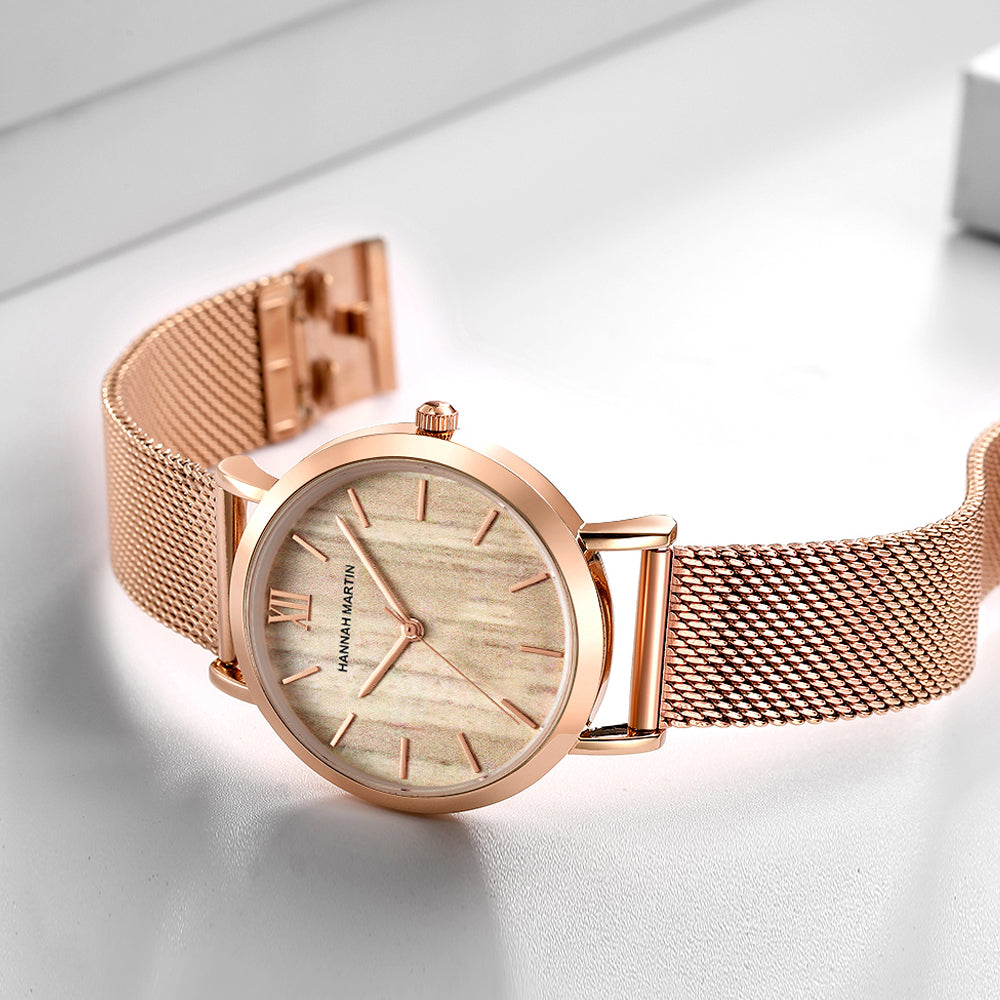 Arrival Japan Quartz Movement wood grain wristwatch with stainless steel mesh band, showcasing elegant design and functionality.