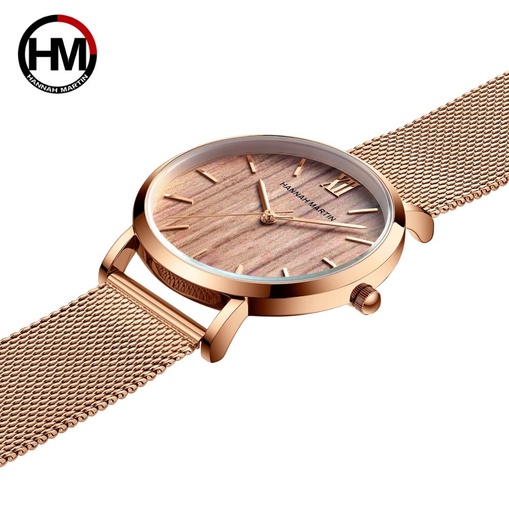 Arrival Japan Quartz Movement wood grain wristwatch with stainless steel mesh band, showcasing elegant design and functionality.