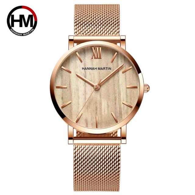 Arrival Japan Quartz Movement wood grain wristwatch with stainless steel mesh band, showcasing elegant design and functionality.