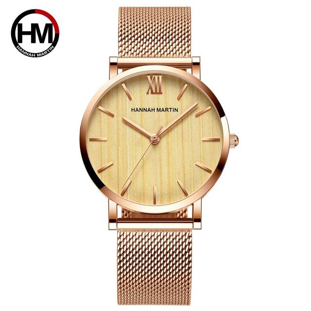 Arrival Japan Quartz Movement wood grain wristwatch with stainless steel mesh band, showcasing elegant design and functionality.