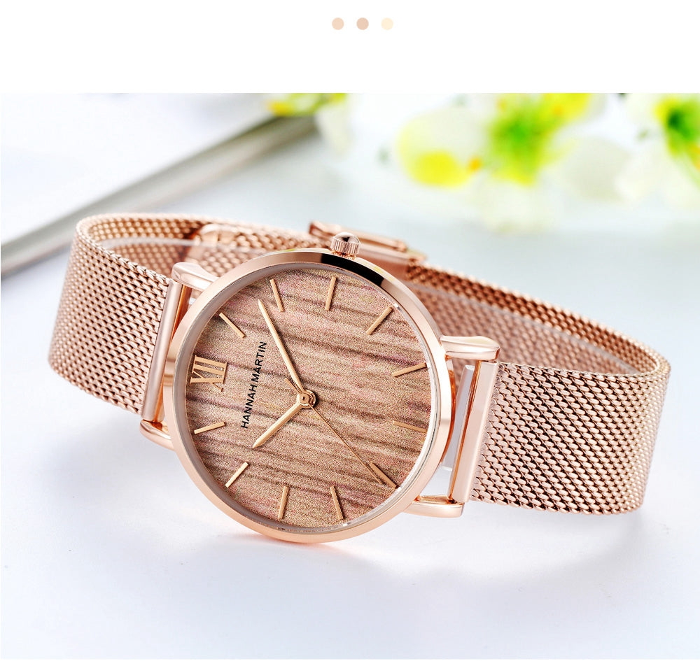 Arrival Japan Quartz Movement wood grain wristwatch with stainless steel mesh band, showcasing elegant design and functionality.