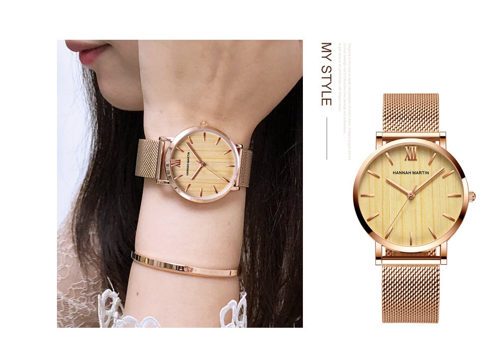 Arrival Japan Quartz Movement wood grain wristwatch with stainless steel mesh band, showcasing elegant design and functionality.