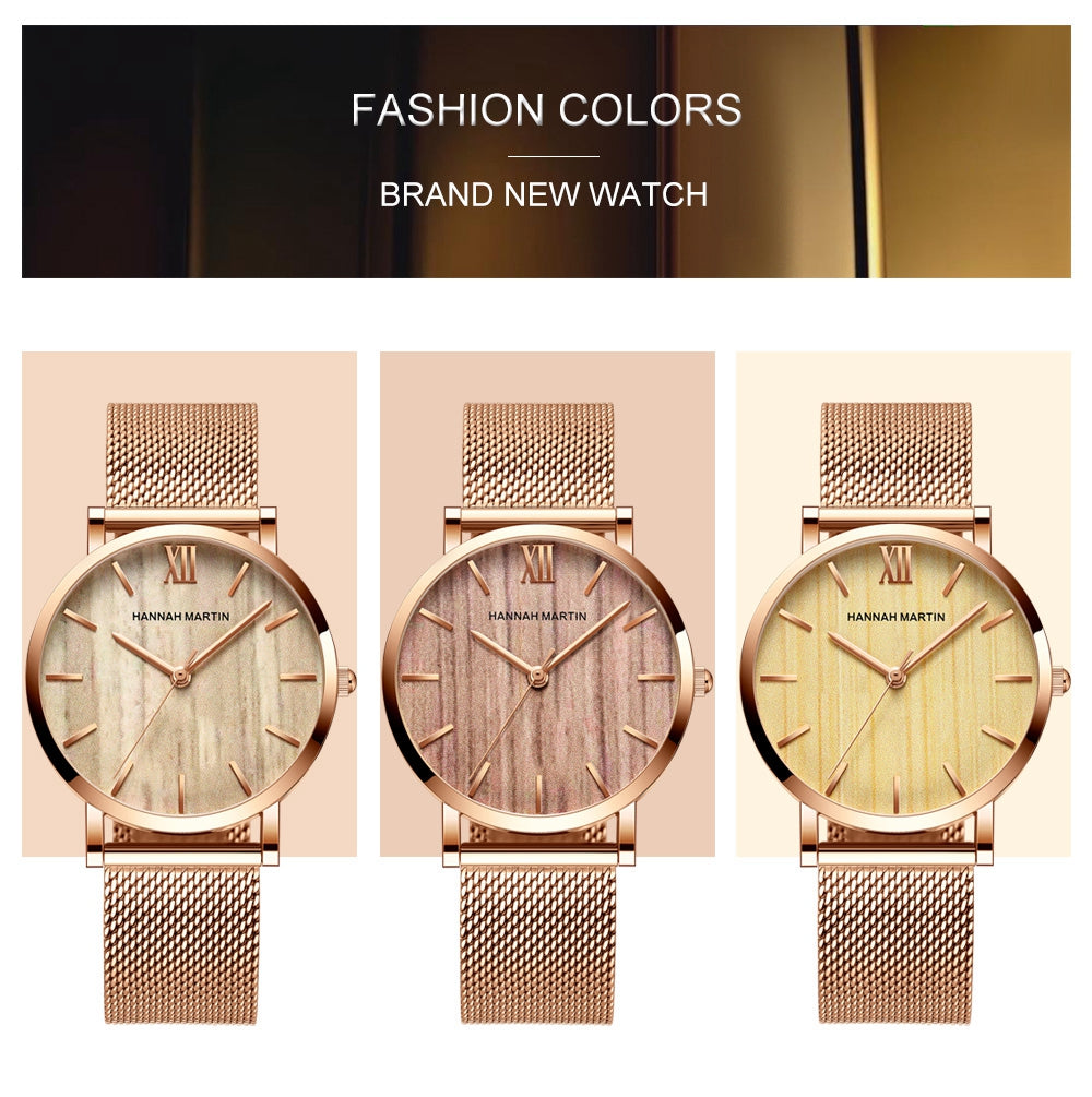 Arrival Japan Quartz Movement wood grain wristwatch with stainless steel mesh band, showcasing elegant design and functionality.