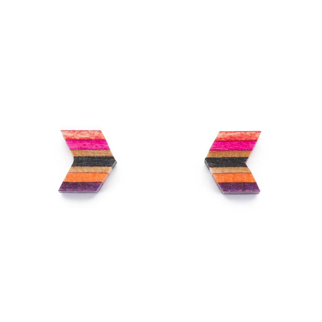 A pair of Arrow Colourful Recycled Skateboard Stud Earrings showcasing vibrant colors and unique patterns from upcycled skateboard materials.