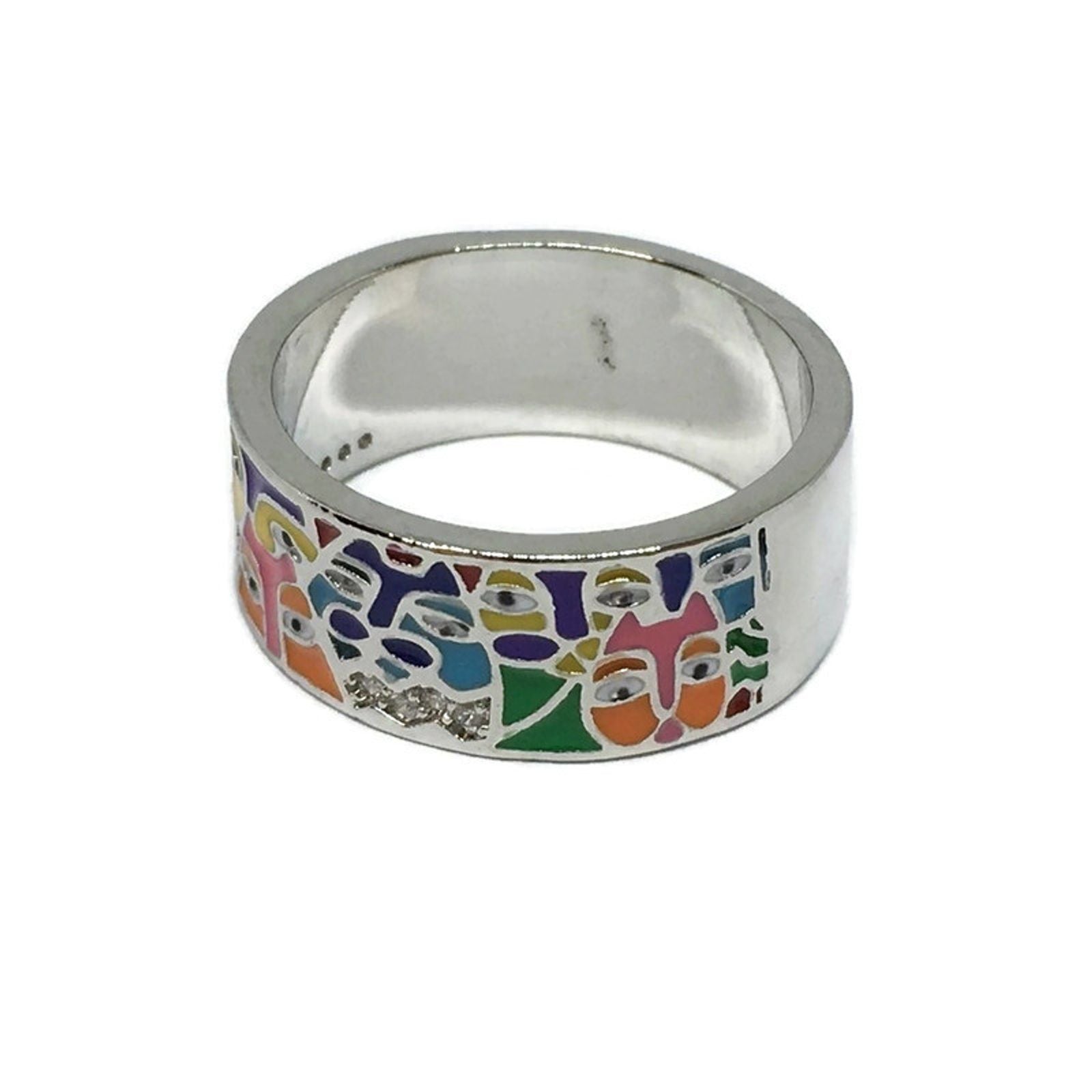 Art Deco Faces Band Ring made of stainless steel, featuring intricate geometric patterns and a polished finish, suitable for unisex wear.