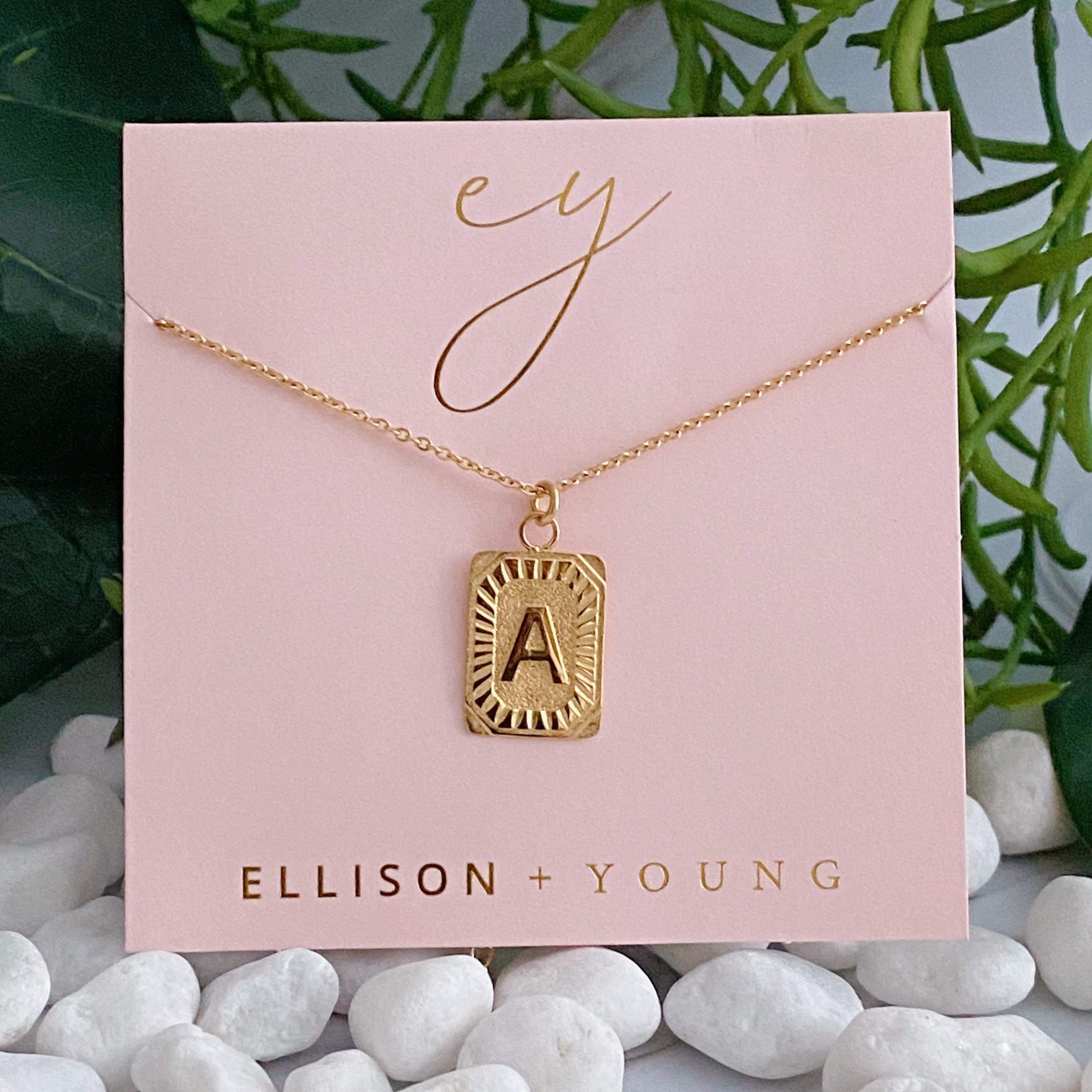 Art Deco Initial Necklace featuring a gold bar charm on a delicate chain, perfect for layering.