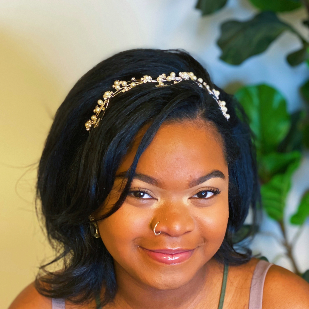 Artful Snow Flower Headband featuring pearls and sparkly stones on a delicate wire frame.