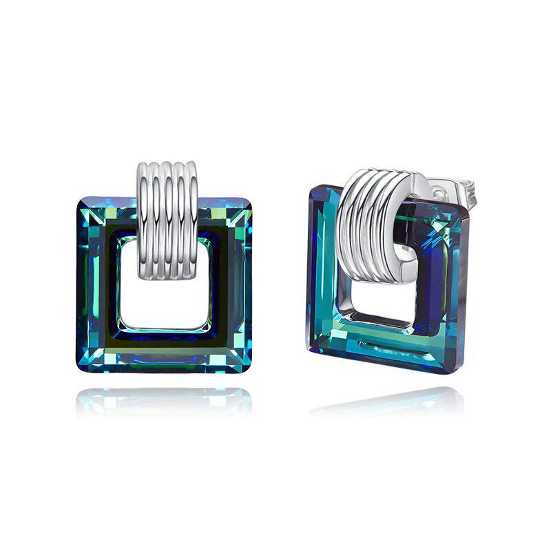 Aruba Blue Cubic Zirconia Square Shaped Studs in Rhodium Plating, showcasing vibrant blue stones and elegant design.