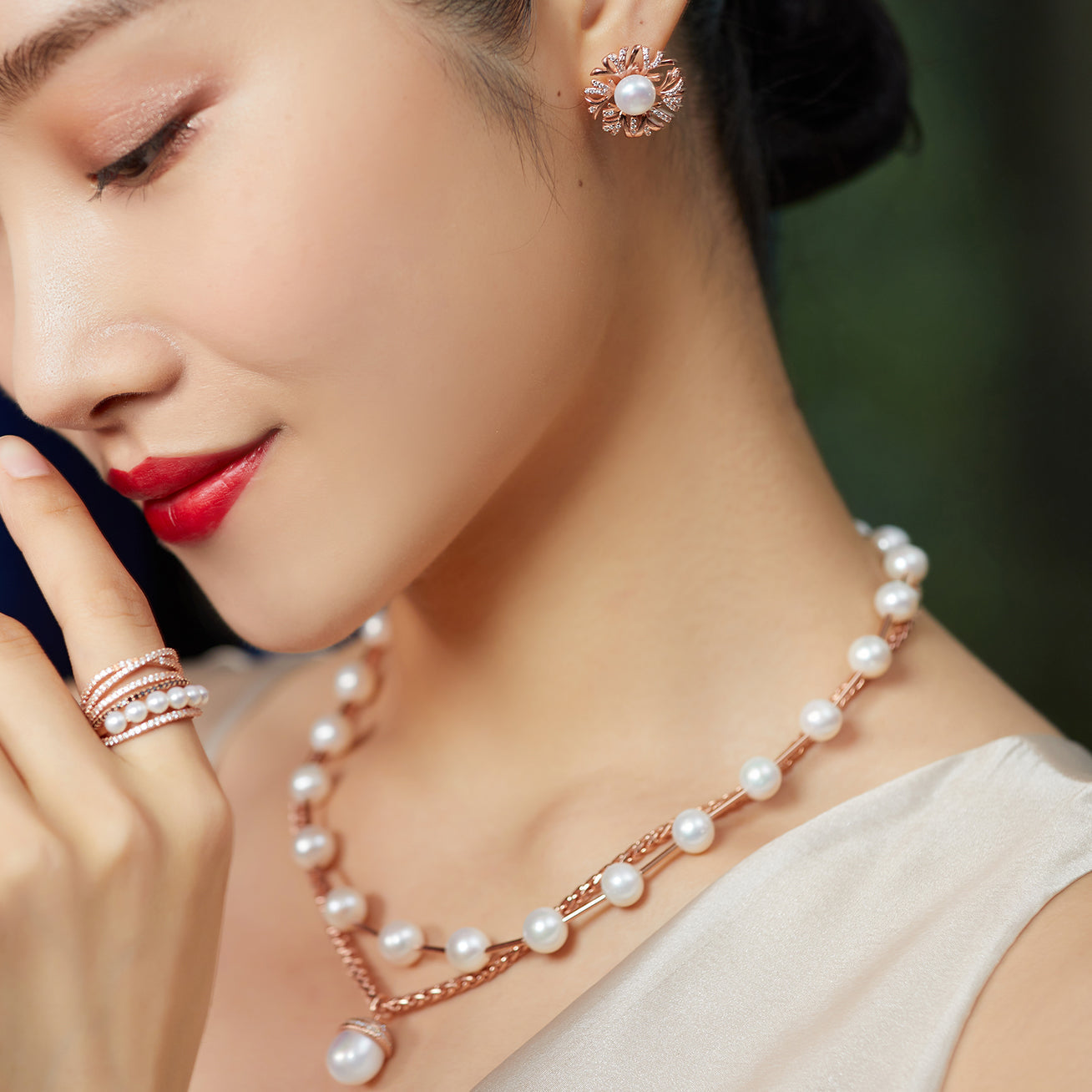 Asian Civilisations Museum Freshwater Pearl Necklace featuring lustrous white pearls and elegant spiral design in sterling silver with gold plating.