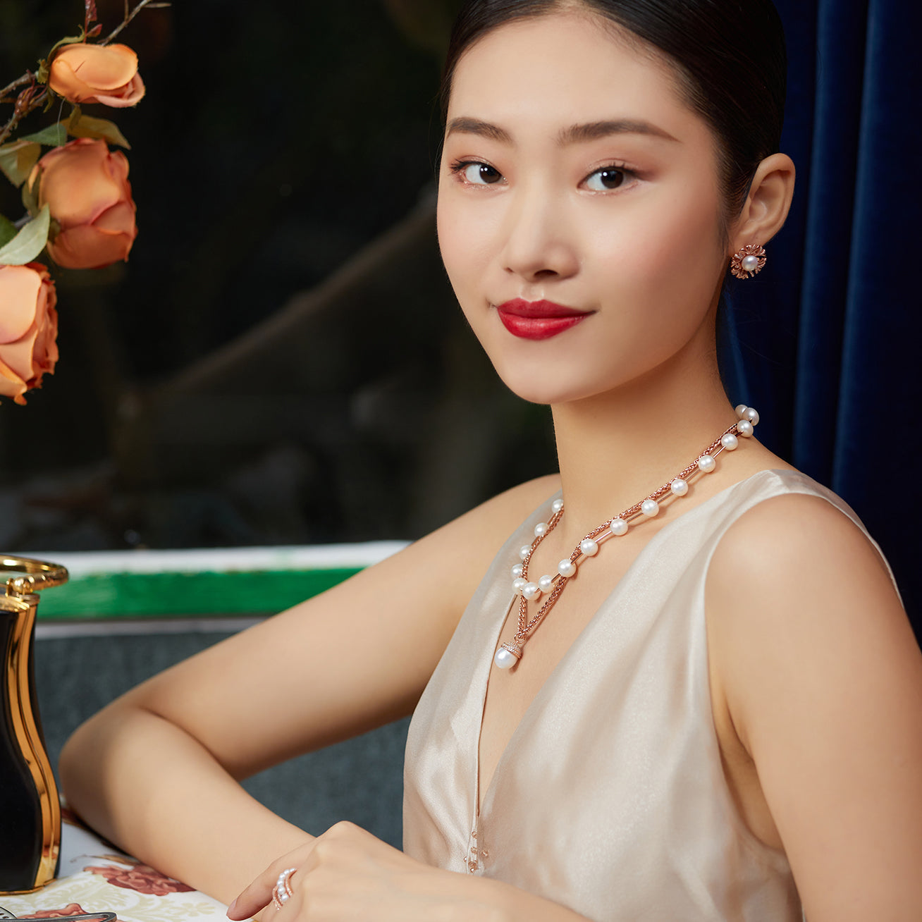 Asian Civilisations Museum Freshwater Pearl Necklace featuring lustrous white pearls and elegant spiral design in sterling silver with gold plating.