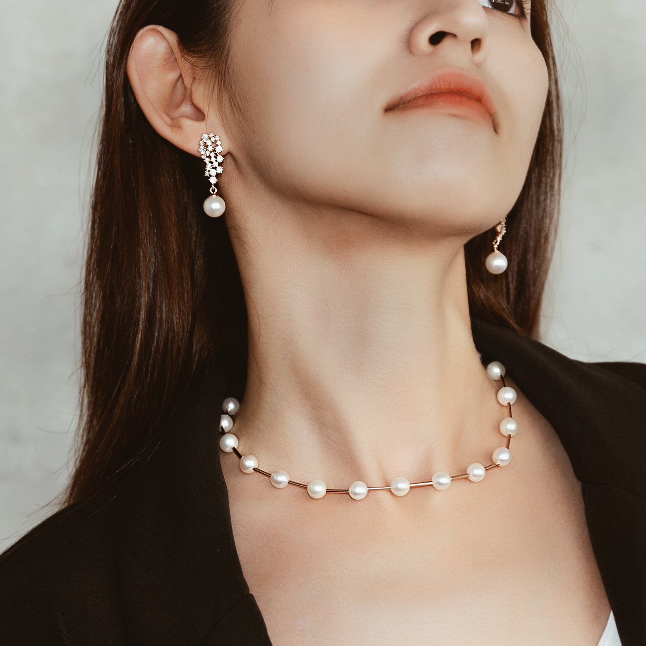 Asian Civilisations Museum Freshwater Pearl Necklace featuring lustrous white pearls and elegant spiral design in sterling silver with gold plating.