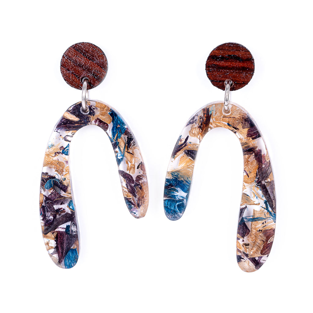 Aspen U Shaped Statement Resin Earrings made from recycled skateboard shavings and plant resin, showcasing unique colors and patterns.