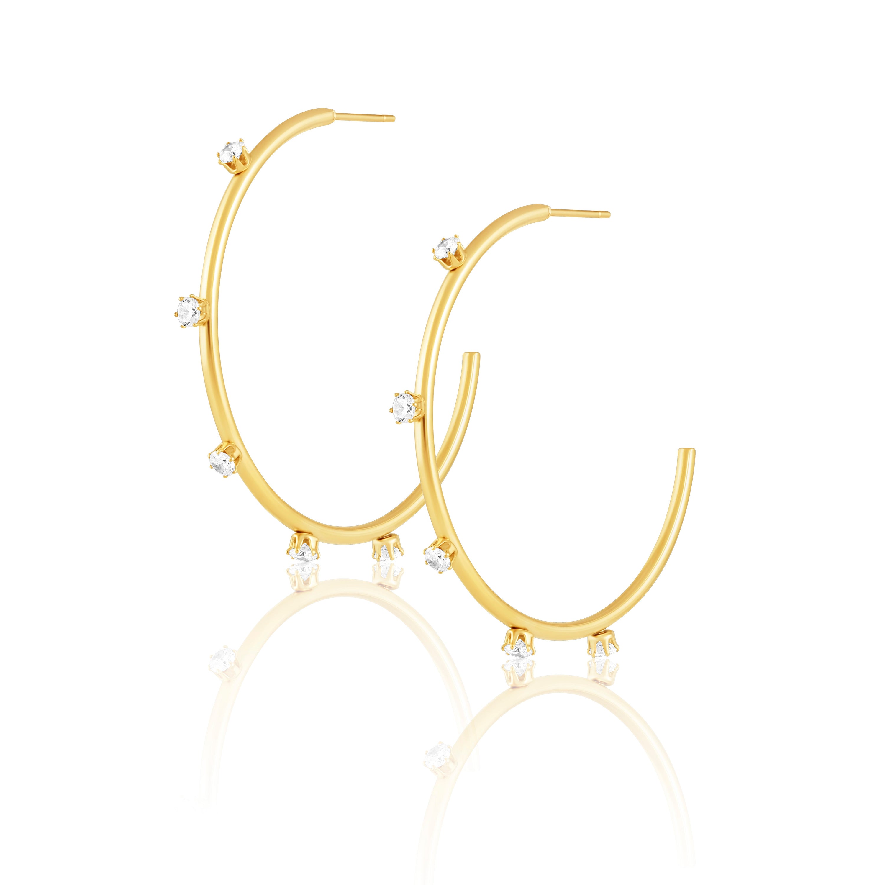 Aster Hoops featuring a lightweight gold-plated design with sparkling cz stones, perfect for everyday elegance.