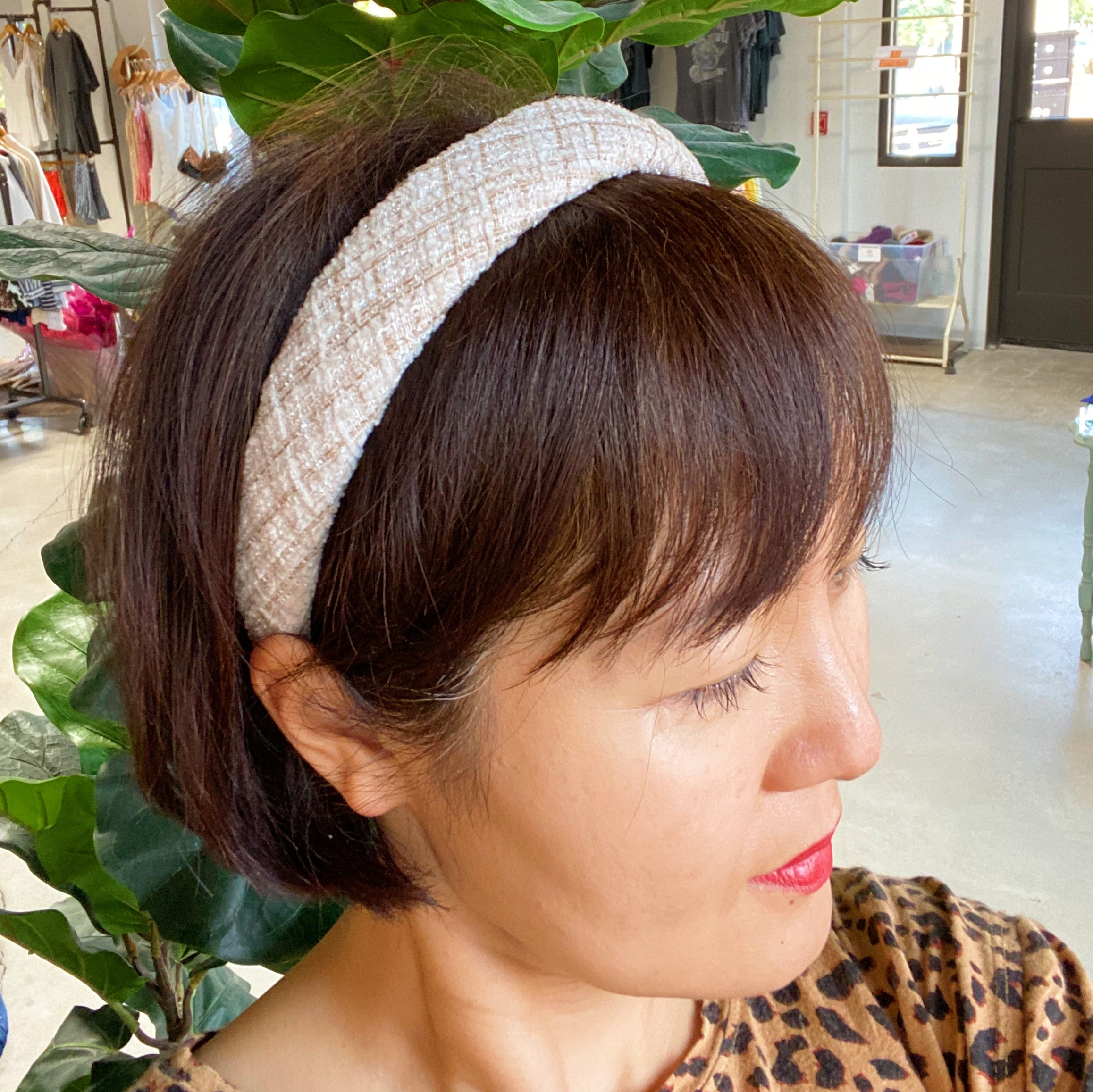 Astoria Tweed Headband featuring classic tweed detailing and soft edges for comfort.