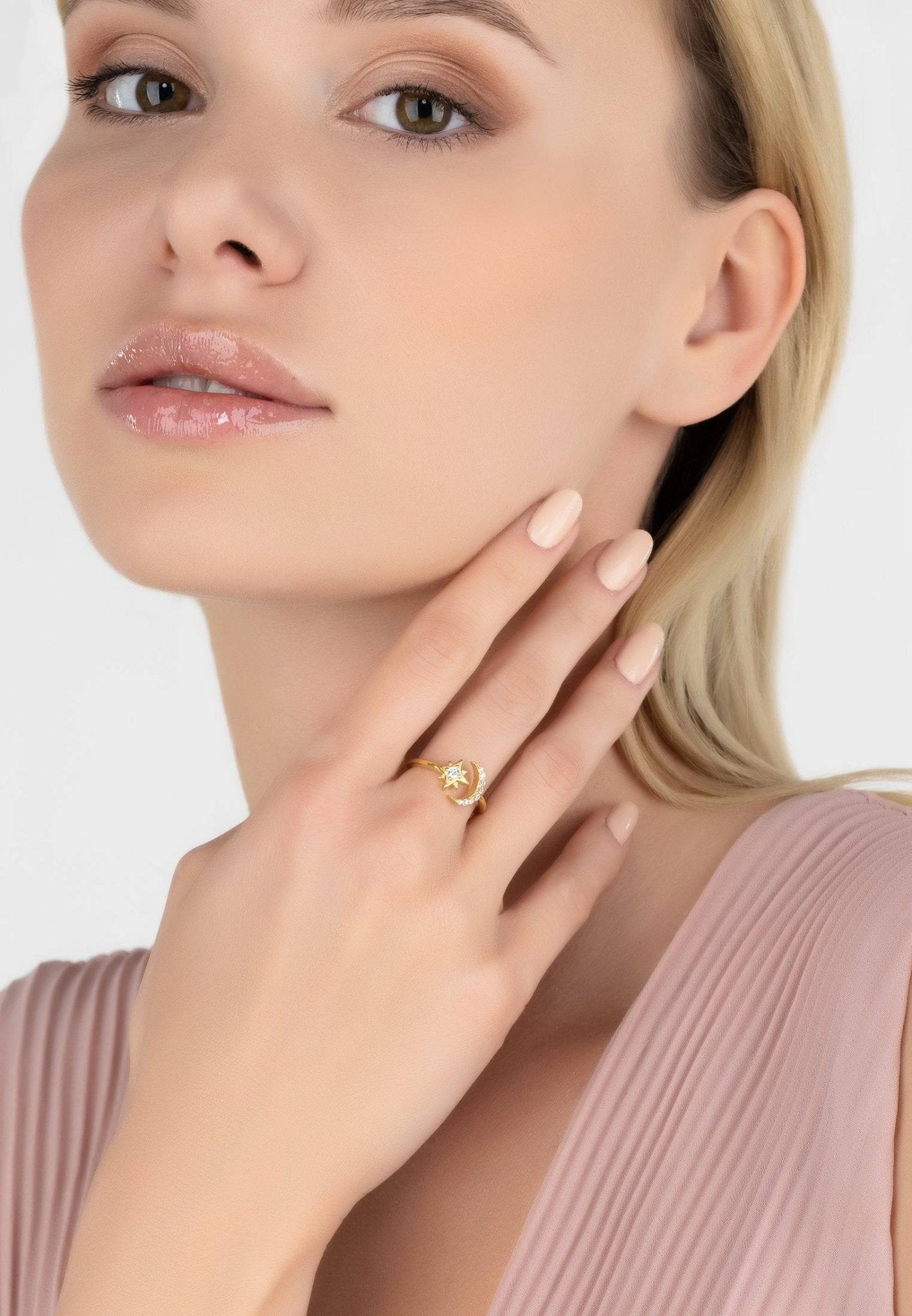 Astrid Moon & Star Ring Gold featuring a crescent moon and star design with white zircons, handcrafted in 925 sterling silver dipped in 22ct gold.