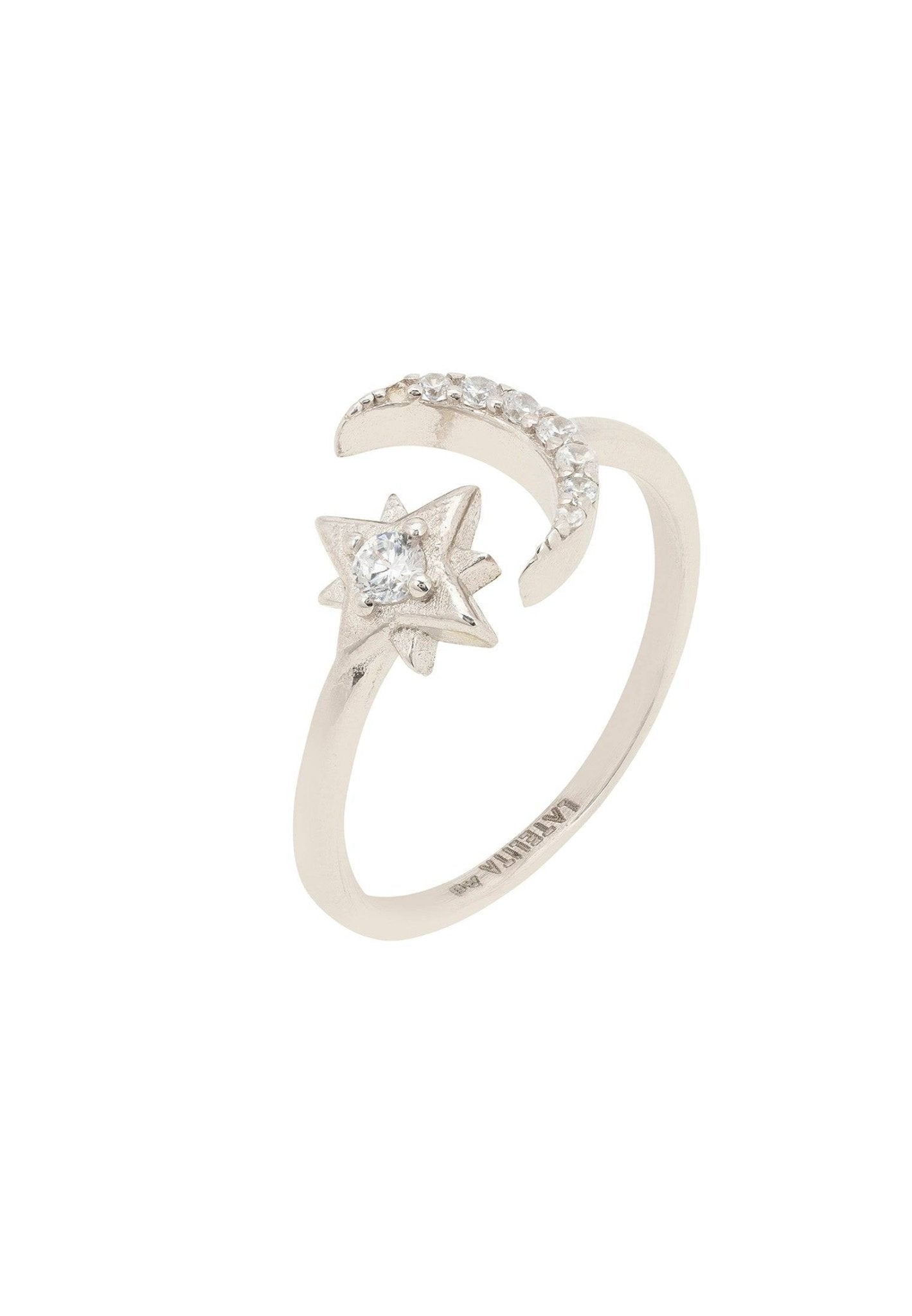 Astrid Moon & Star Ring in silver featuring a crescent moon and star design adorned with white cubic zirconia, adjustable size.