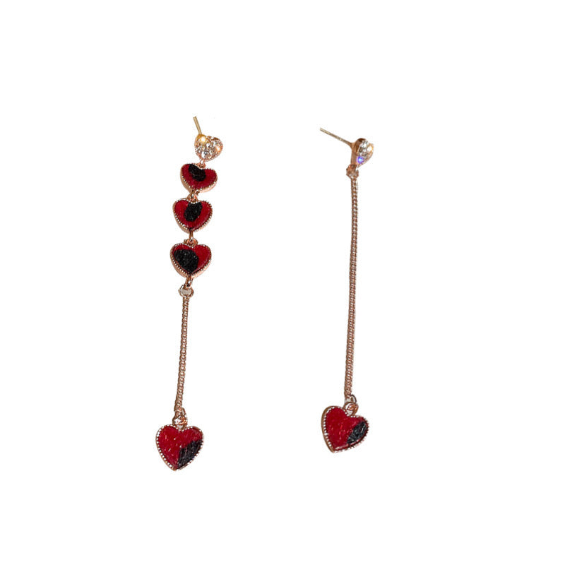 Asymmetric long earrings featuring red heart designs with rhinestones, crafted from alloy and S925, showcasing a modern and elegant style.