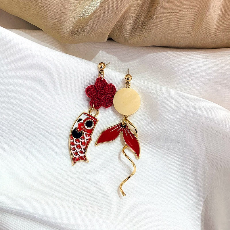 Asymmetric Red Koi Earrings featuring a vibrant koi design in red, crafted from alloy and 925 silver, showcasing unique shapes and dimensions.