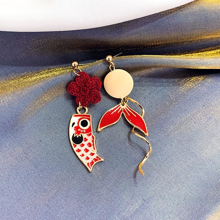 Asymmetric Red Koi Earrings featuring a vibrant koi design in red, crafted from alloy and 925 silver, showcasing unique shapes and dimensions.