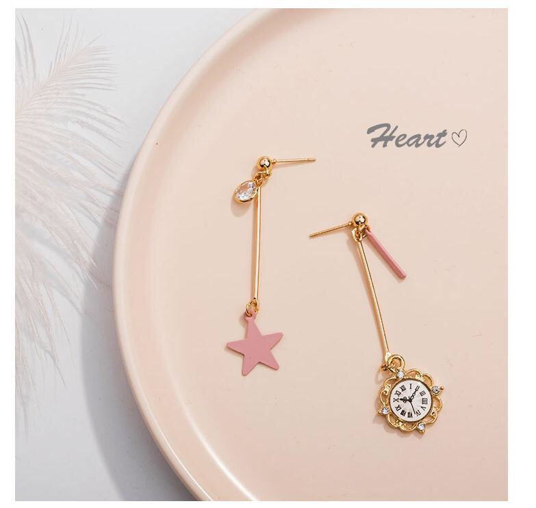 Asymmetric Star and Clock Dangling Earrings featuring rhinestones and alloy material, showcasing a unique design.