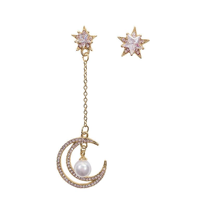 Asymmetric earrings featuring a star and moon design with tassels, crafted from alloy, showcasing a unique and stylish look.