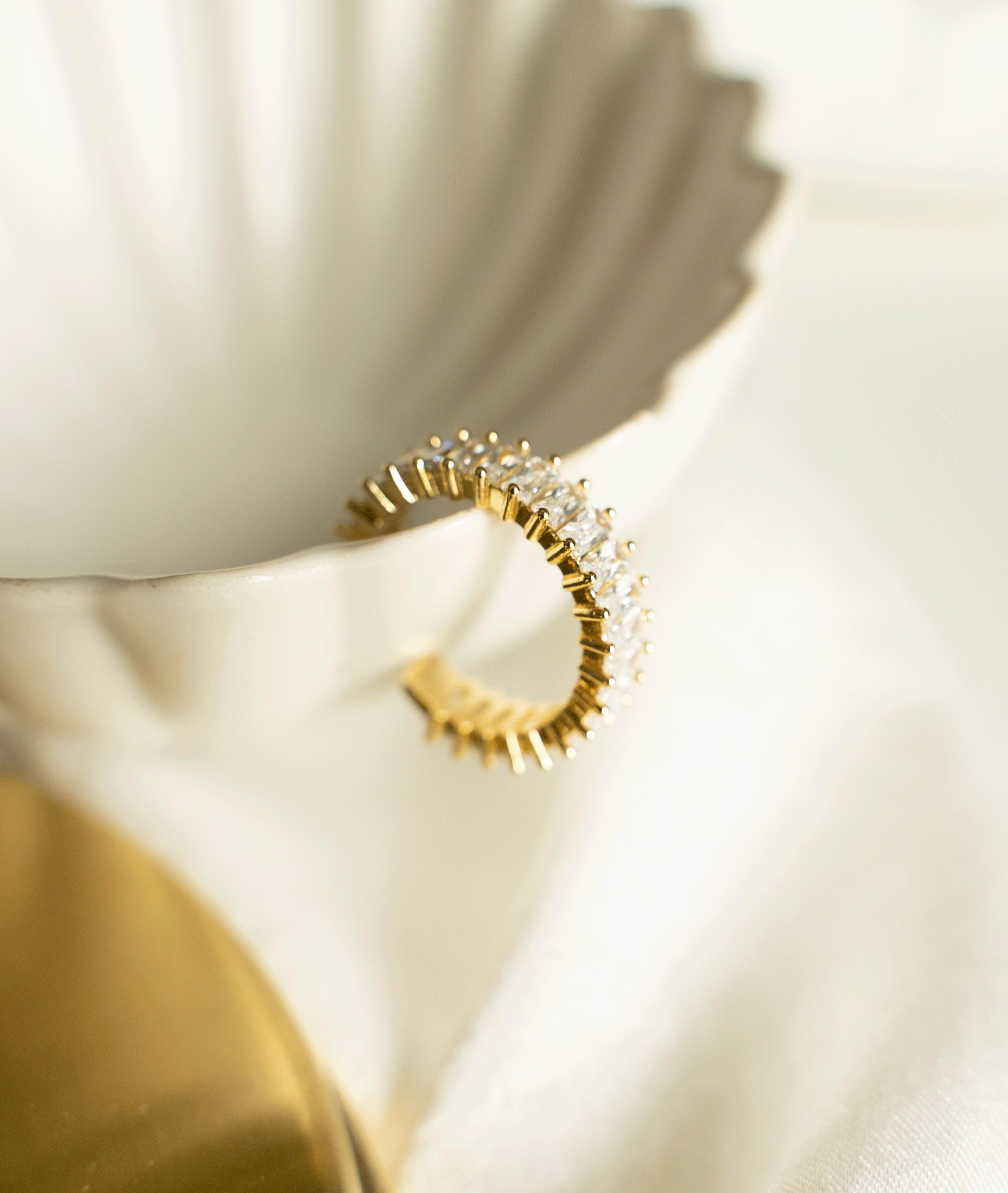 ATHENA Ring featuring adjustable design, 18K gold plated stainless steel, and baguette stones, perfect for stacking.