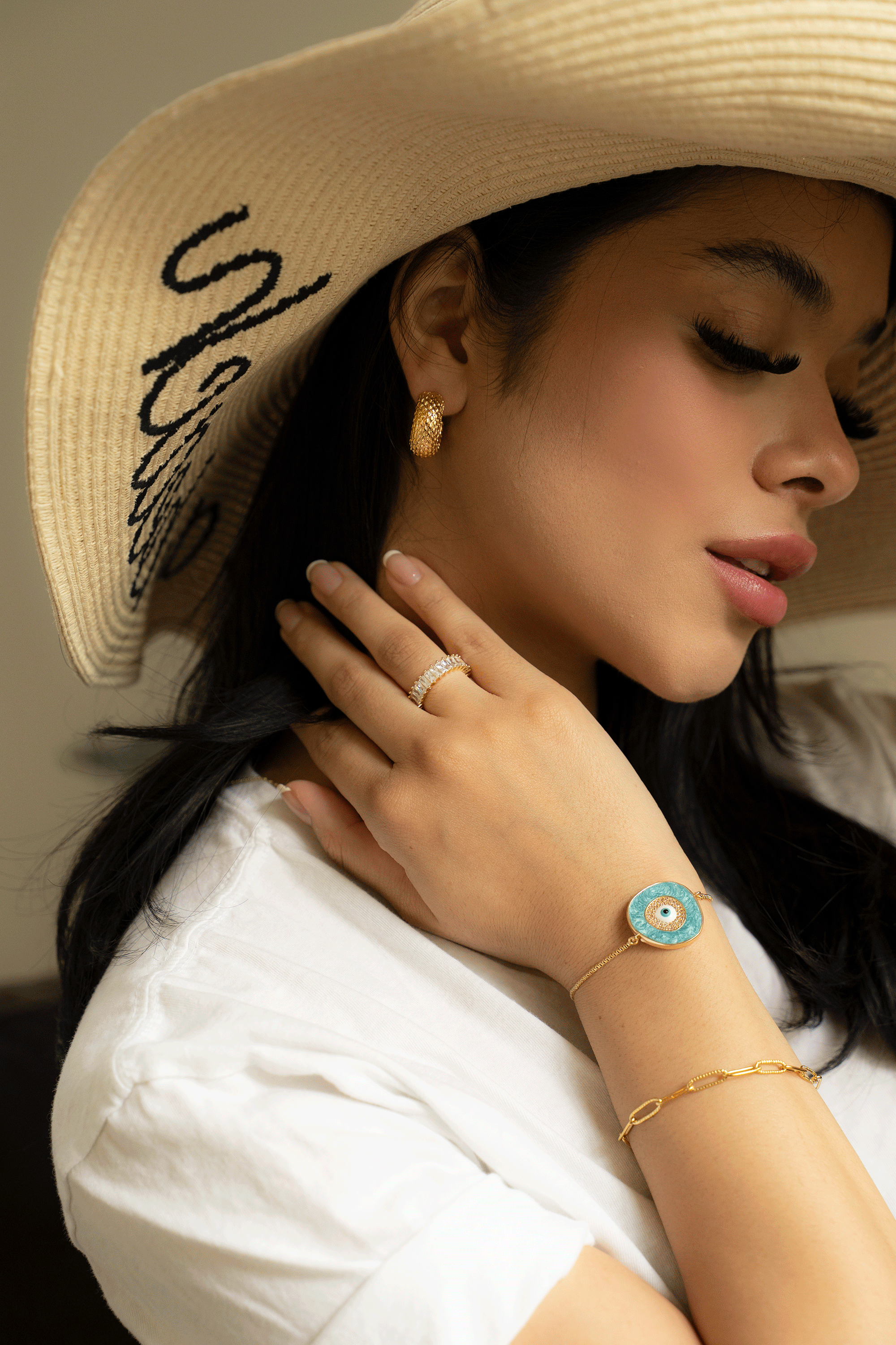 ATHENA Ring featuring adjustable design, 18K gold plated stainless steel, and baguette stones, perfect for stacking.